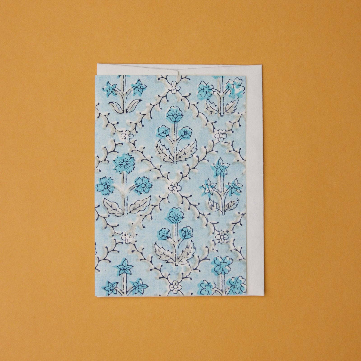 Carte fleurie – Treillis jardin bleu