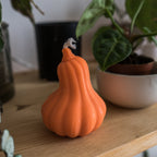 Orange pumpkin decorative candle