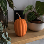 Orange pumpkin decorative candle