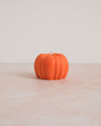 Orange pumpkin decorative candle
