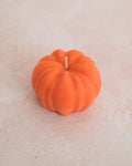 Orange pumpkin decorative candle