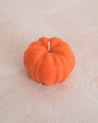 Orange pumpkin decorative candle